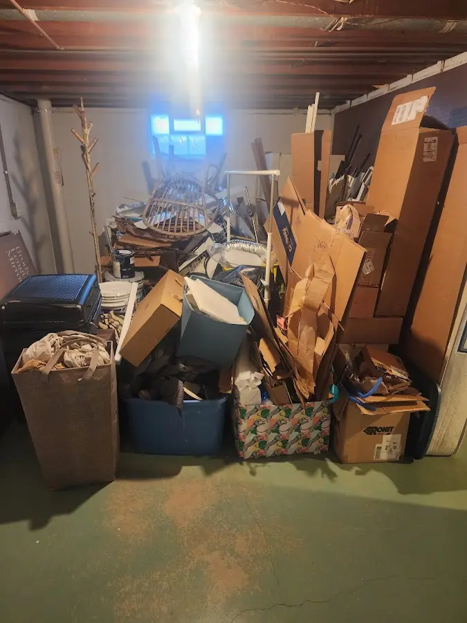 Roll-off dumpster container at job site for Cleanout Dumpster Rental in Clarksville